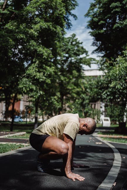 Beginner practicing bodyweight squats in a park at sunset with a supportive friend nearby.
