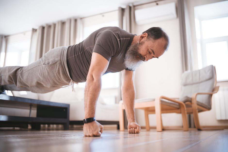 Man doing push ups at home in the morning